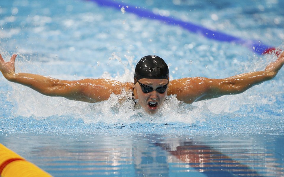 Дана Волмер е олимпийска шампионка по плуване на 100 метра бътерфлай