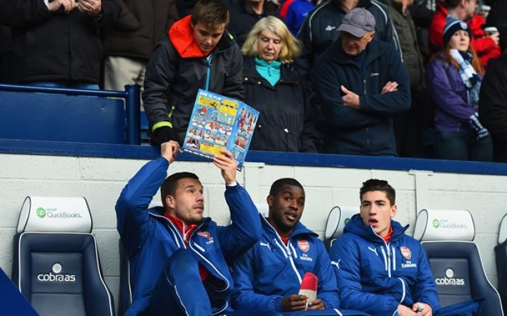 Подолски продава селфи с Меркел