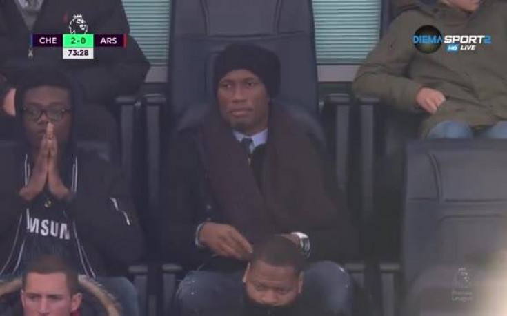 Дрогба на трибуните на 