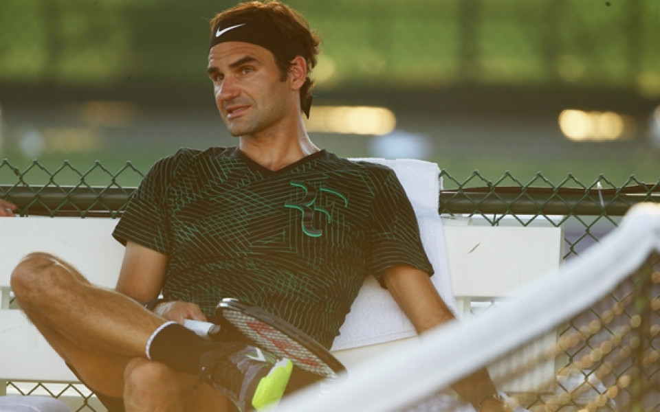 Федерер позира за снимка с полугола фенка