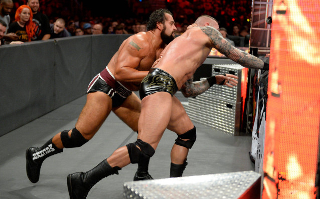 Rusev sends Randy Orton crashing into the ringside barrier WWE