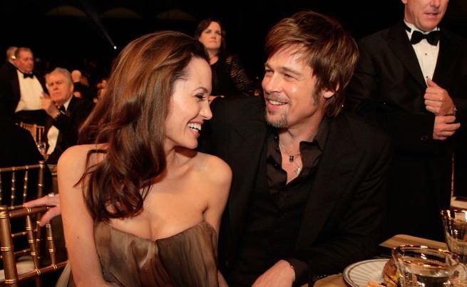 Анджелина Джоли и Брад Пит по време на парти