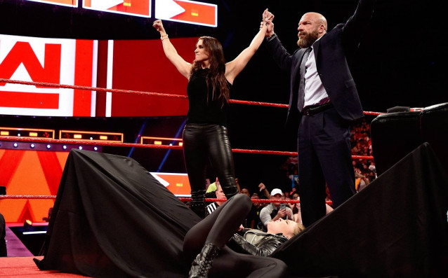 Stephanie McMahon sends Ronda Rousey crashing through a table Raw