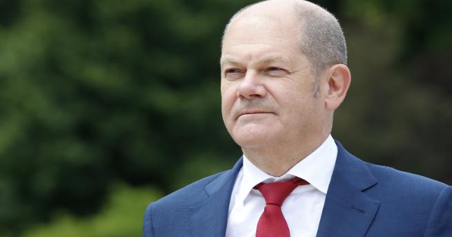 Германският министър на финансите Олаф Шолц похвали споразумението между канцлерката