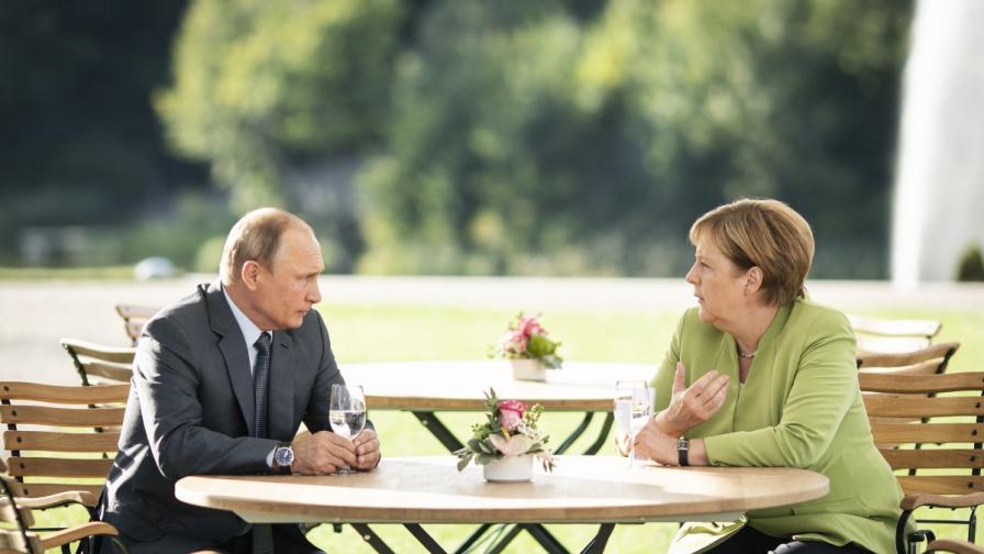 Президентът на Русия Владимир Путин и германският канцлер Ангела Меркел
