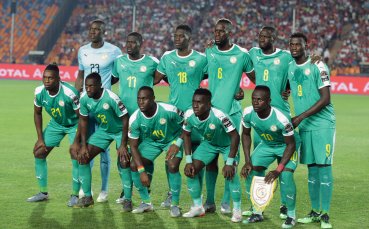 Капитанът на националния тим на Сенегал Калиду Кулибали и вратарят