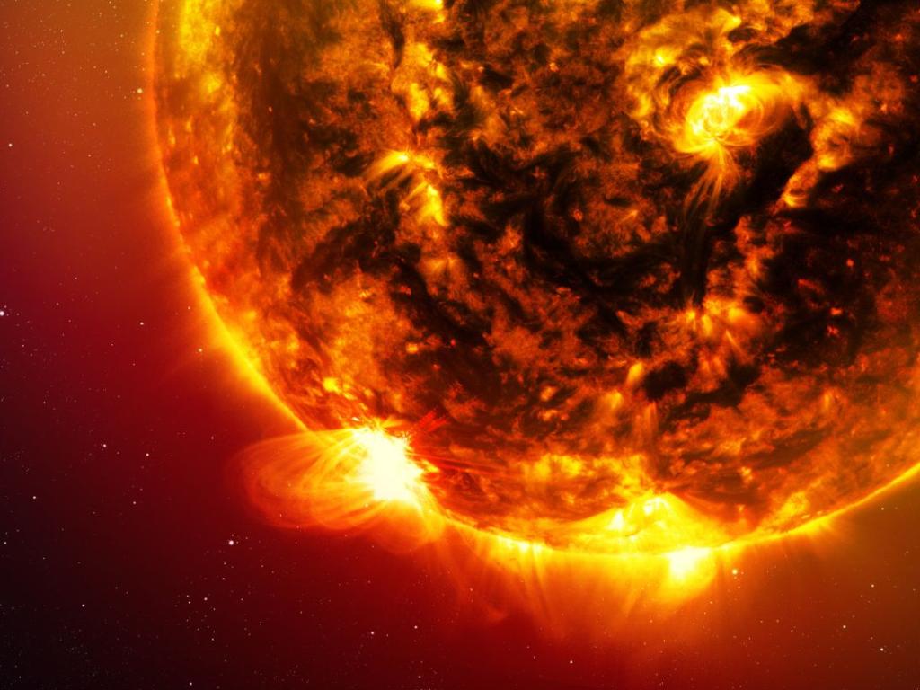 Гигантско хиперактивно слънчево петно което отприщи три слънчеви изригвания от
