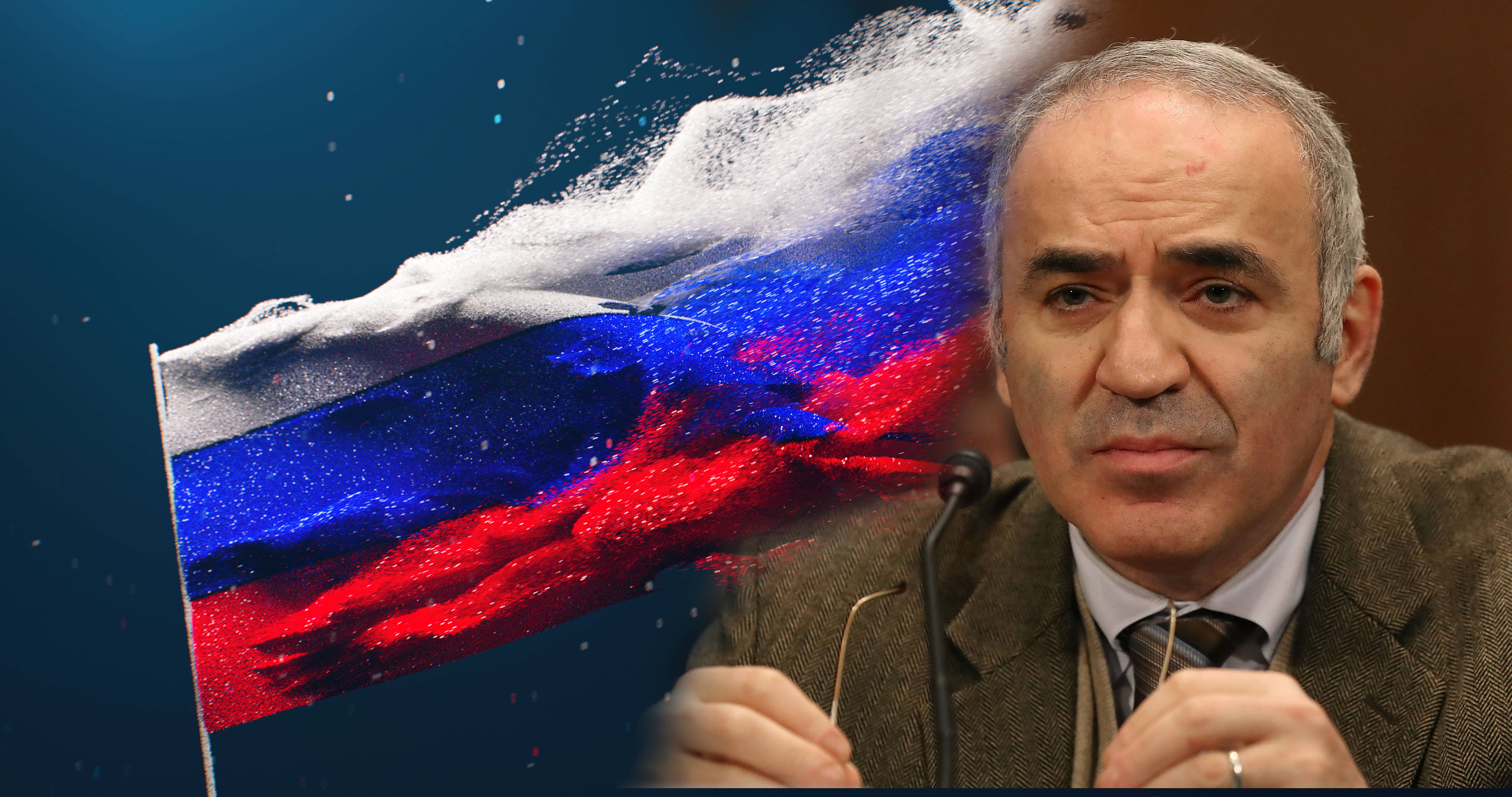 На снимката е показан Гари Каспаров на фона на руското национално знаме.