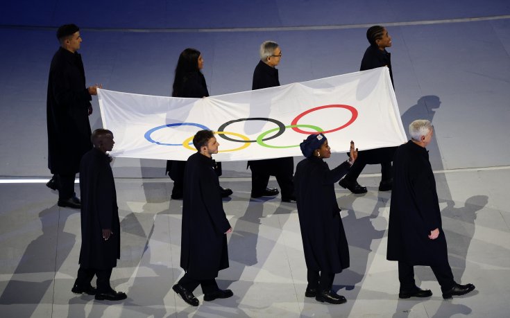 Олимпийският флаг