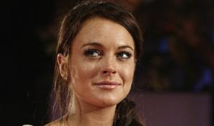 Линдзи Лоън, която е филмова звезда от дете, на червения килим в Кан 2006