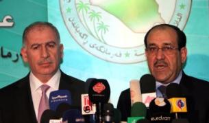 Иракският премиер Нури ал Малики (вдясно) и председателят на парламента Усама ан Нуджайфи