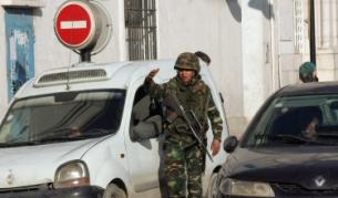 Бен Али избягал с тон и половина злато