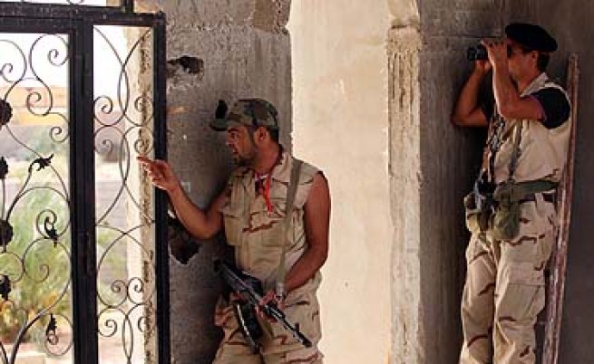 Кадафи държал стотици либийци в незаконни затвори
